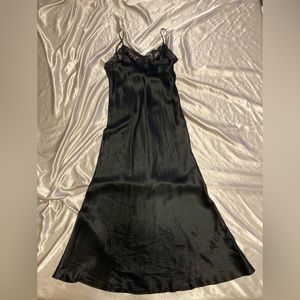 Long length silk slip in black.